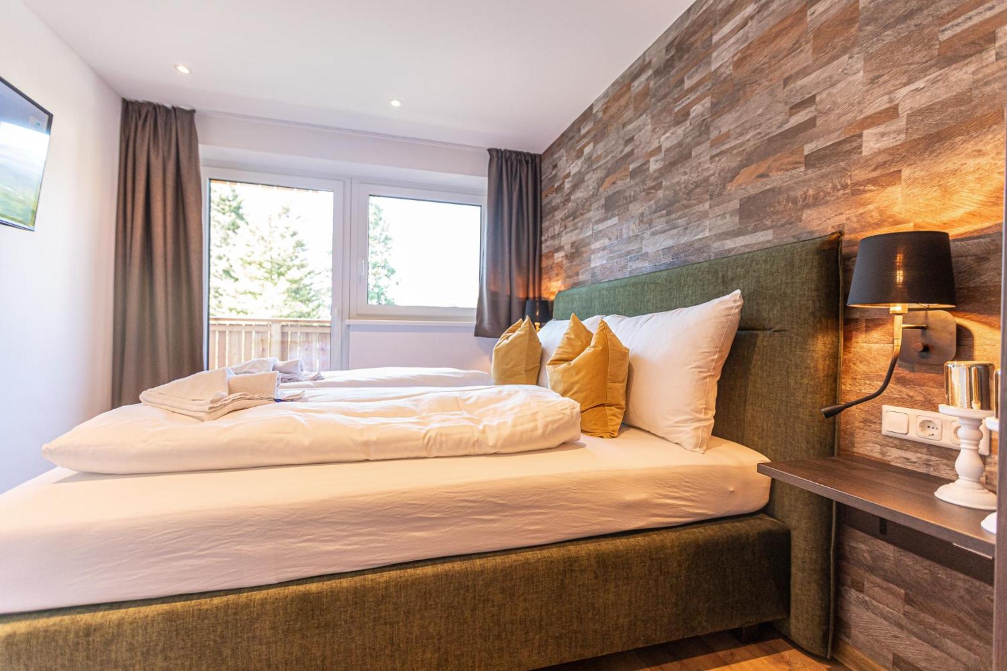Tevini Boutique Suites By We Rent Zell am See Quarto foto